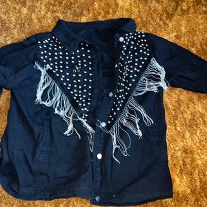 Black jean and metal fringe jacket